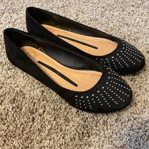 Black flats with silver stone details
